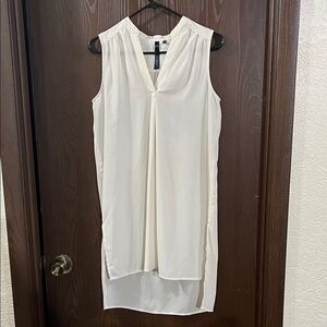 Sleeveless White Blouse